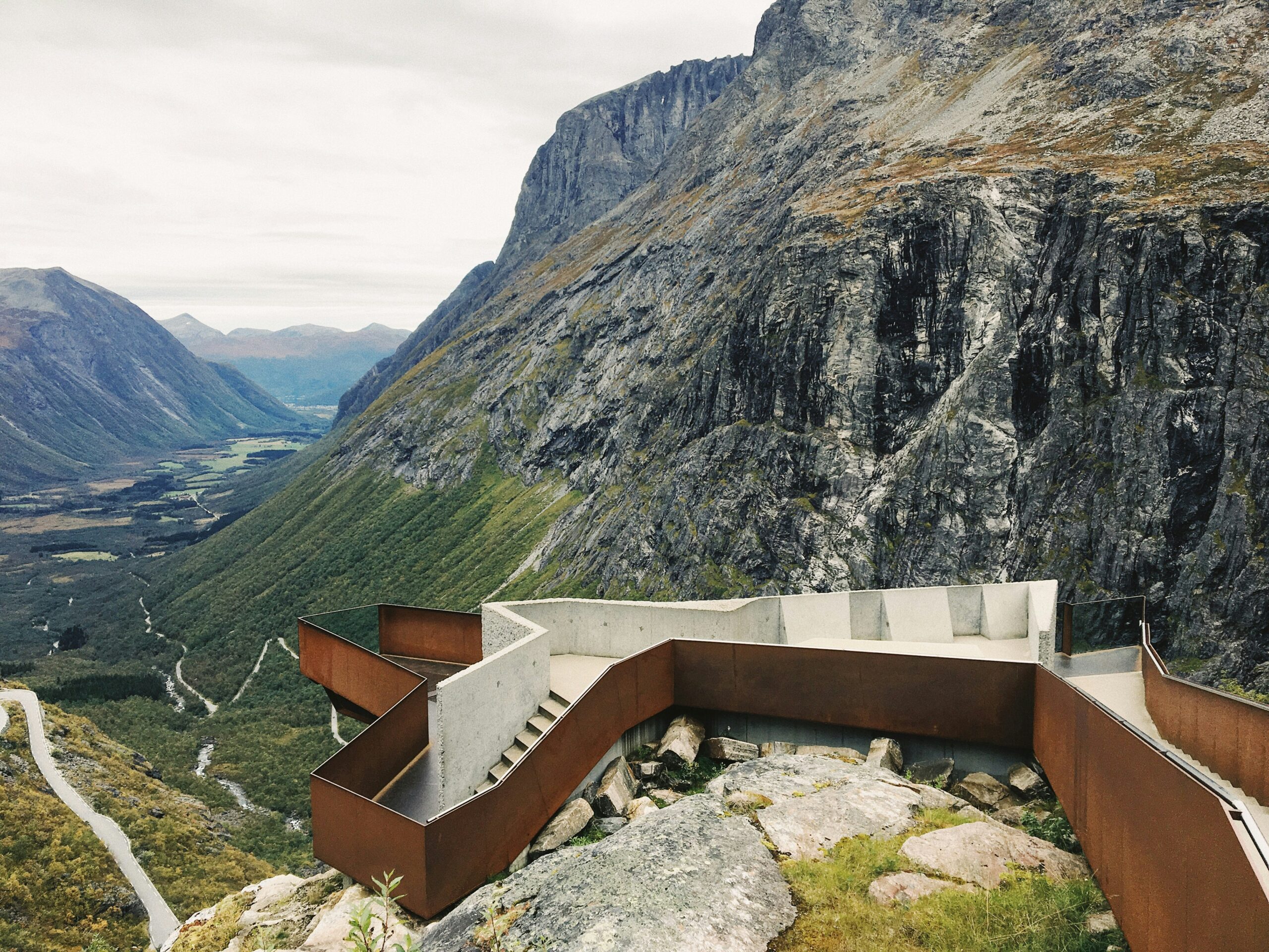 white and brown structure near mountain